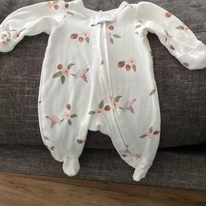 Carters white hummingbird and flowers footie pjs. Never worn. Size P